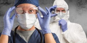 Female and Male Doctors or Nurses Wearing Scrubs