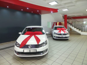 CARS WITH RED BOW
