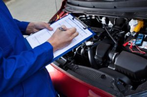 Used Car Buyers Technician Quality Check on Engine
